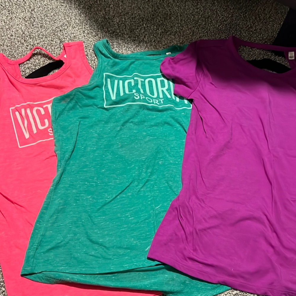 Three Victoria’s Secret work out tops
